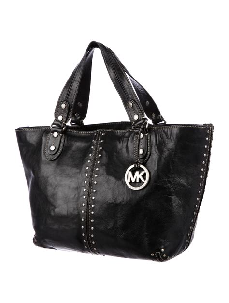 white michael kors shoulder bag|Michael Kors black studded handbag.